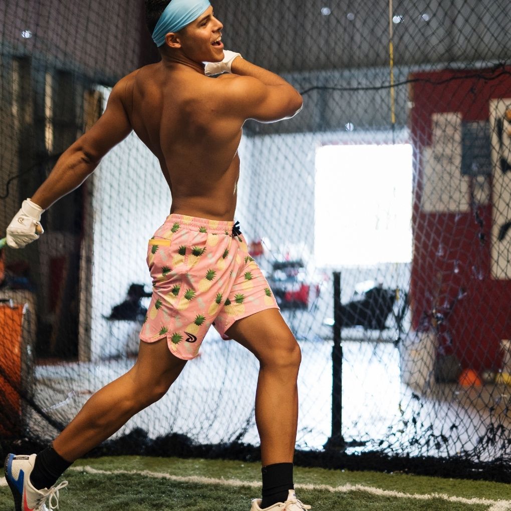 Training with pineapple boardshorts