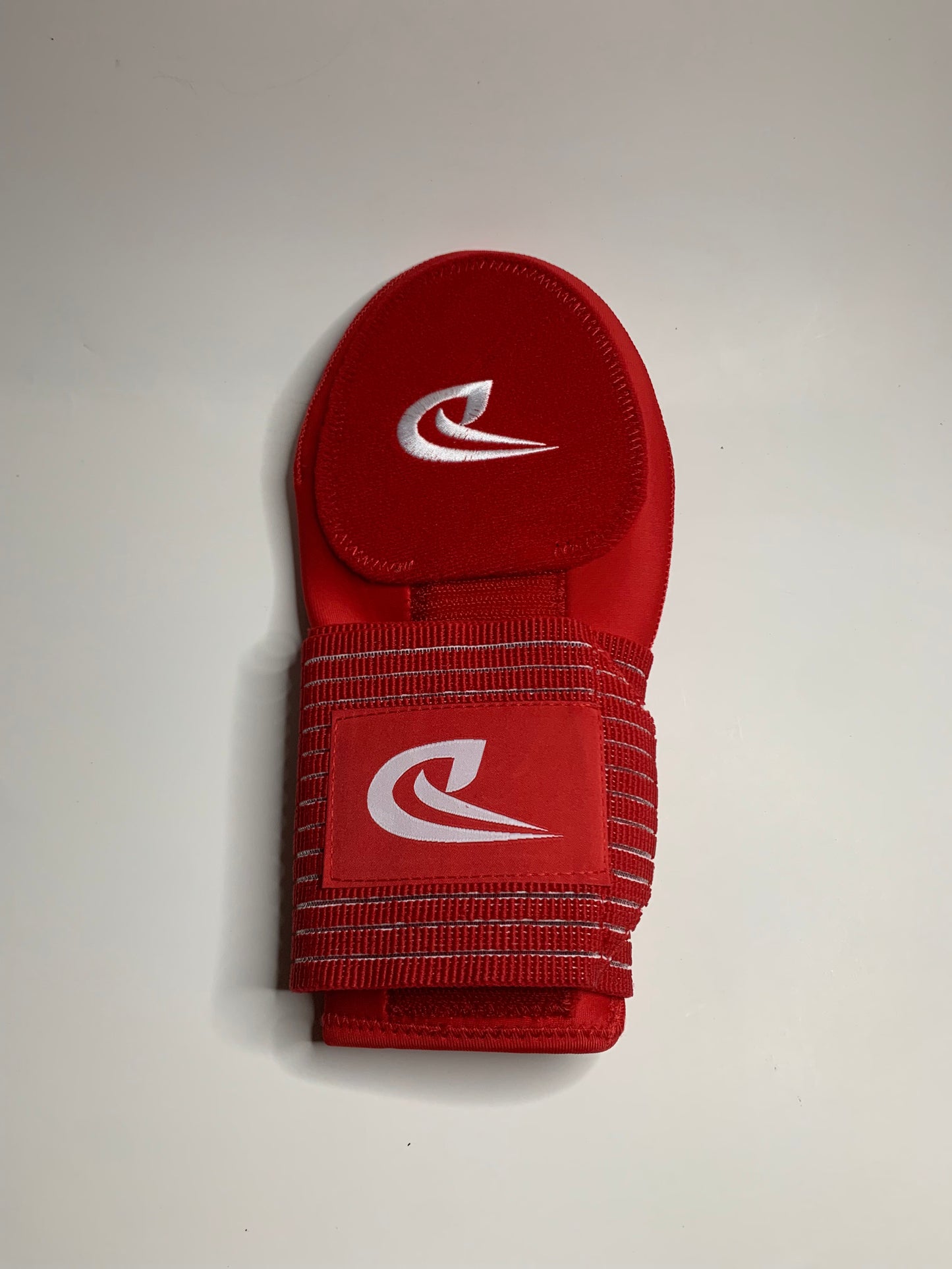 red sliding mitt