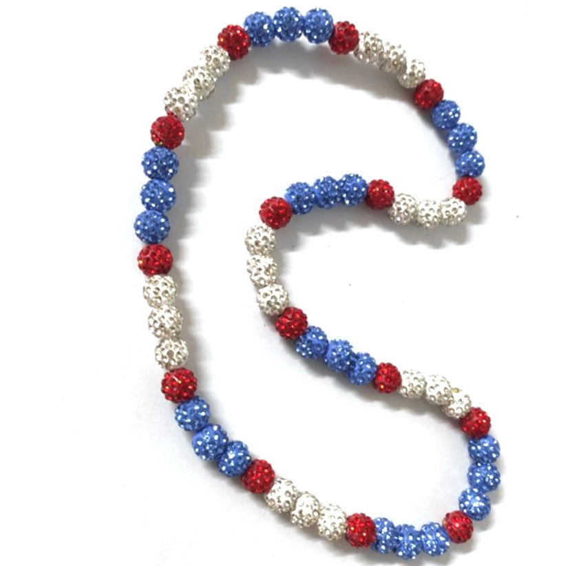 Set of three beaded necklaces in red, white, and blue on a white background