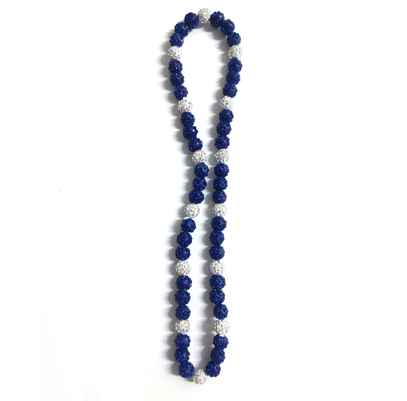 Necklace with blue and silver beads on a white background