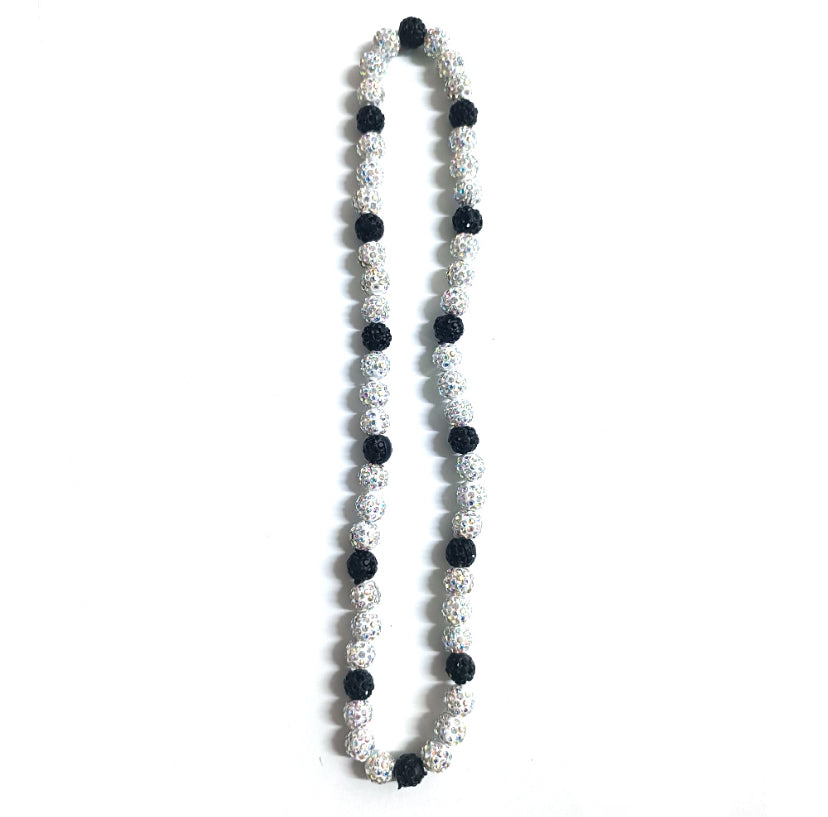 Necklace with black and silver beads on a white background