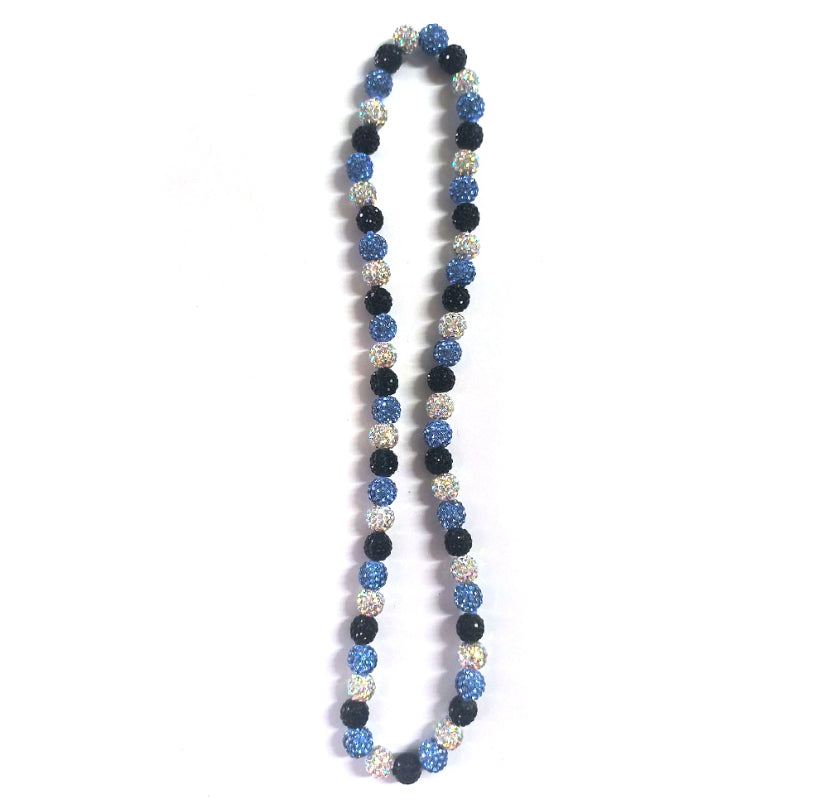Necklace with blue, black, and silver beads on a white background